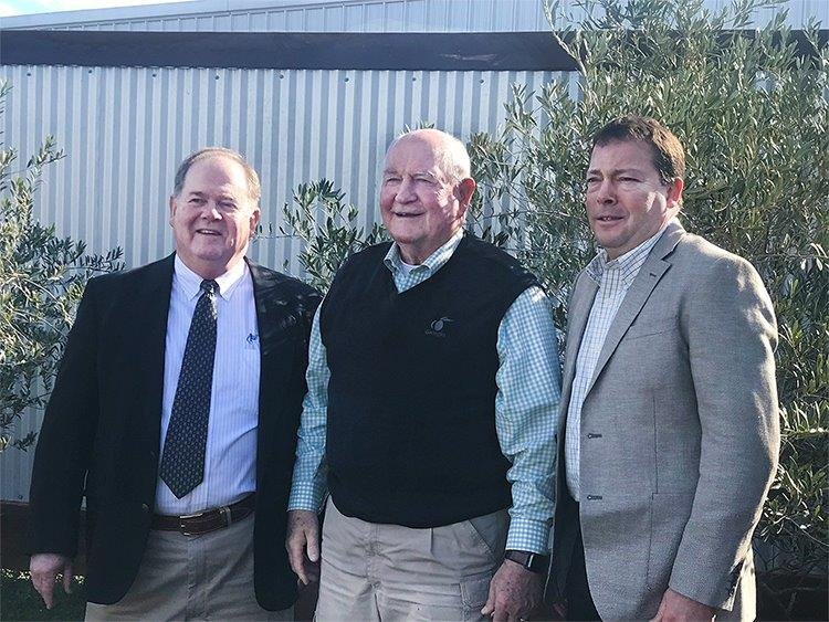 Peoples received a ReConnect Grant to deploy 53.7 miles of fiber optics to unserved areas in Wood and Camp counties. Pictured are, from left, Steven Steele, Peoples general manager; Sonny Perdue, Secretary of Agriculture; and Scott Thompson, Peoples CFO.